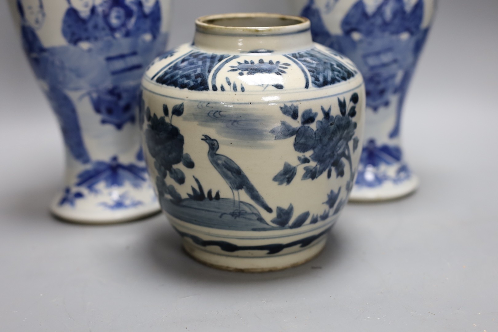 A pair of Chinese blue and white ‘boys’ baluster vases and a Chinese blue and white jar, 19th-century and later 27cm